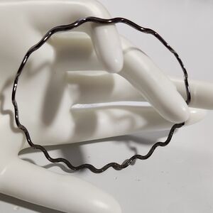 Wavy Silvertone Black Bangle Bracelet